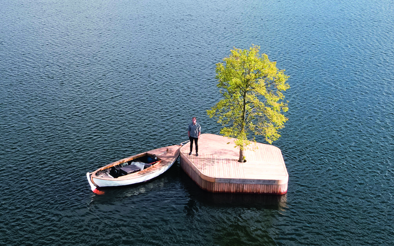 Marshall Blecher and Fokstrot's elegant floating island gracefully navigates Copenhagen's port, a captivating innovation.